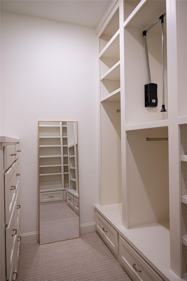 6032 Forest Ln, Fort Worth, TX 76112 - mudroom featuring light colored carpet and baseboards