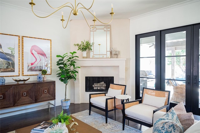 6032 Forest Ln, Fort Worth, TX 76112 - living room featuring ornamental molding, wood finished floors, a fireplace, a chandelier, and french doors