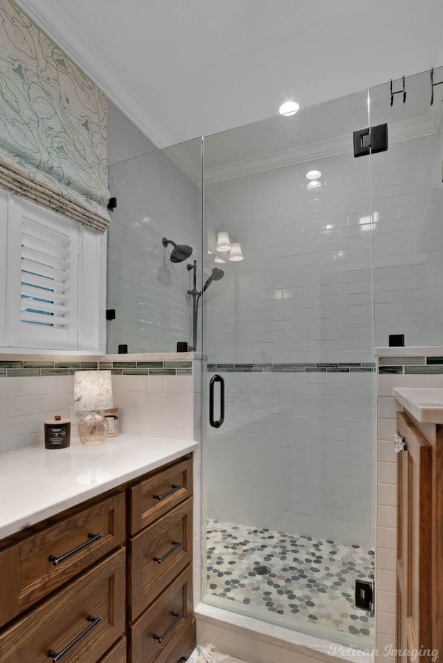5305 S Lakeshore Dr, Shreveport, LA 71109 - full bath featuring crown molding, vanity, a shower stall, tasteful backsplash, and recessed lighting