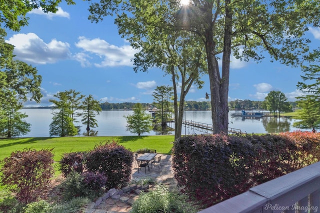 5305 S Lakeshore Dr, Shreveport, LA 71109 - view of grassy yard featuring a water view and a patio