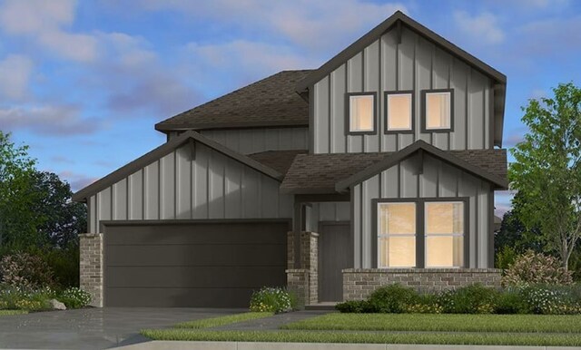 14716 Ledger Ln, Fort Worth, TX 76052 - view of front facade with a shingled roof, board and batten siding, a garage, driveway, and brick siding