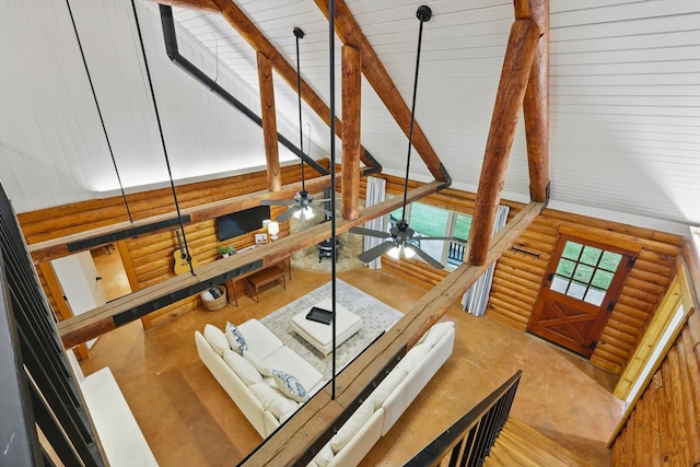 127 Pleasant Valley Ln, Weatherford, TX 76087 - staircase with rustic walls, ceiling fan, a high ceiling, and beam ceiling