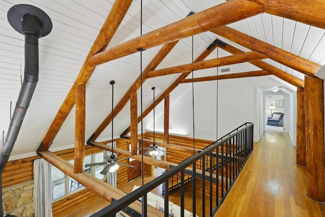 127 Pleasant Valley Ln, Weatherford, TX 76087 - corridor with an upstairs landing and light wood finished floors