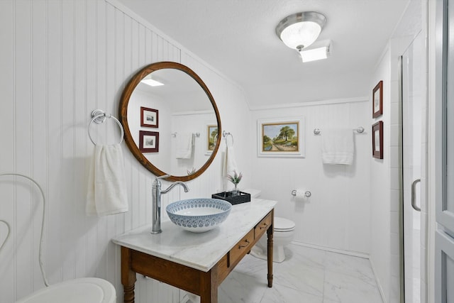 127 Pleasant Valley Ln, Weatherford, TX 76087 - full bathroom with toilet, vanity, a shower stall, and marble look tile flooring