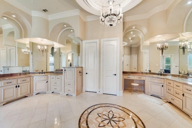 1751 Bison Meadow Ln, Heath, TX 75032 - bathroom with a chandelier, crown molding, two vanities, a high ceiling, and tile patterned floors
