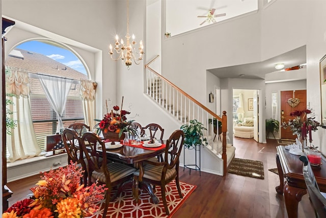 408 Autumn Park Park, Fort Worth, TX 76140 - dining area with stairway, a chandelier, wood finished floors, ceiling fan, and a high ceiling