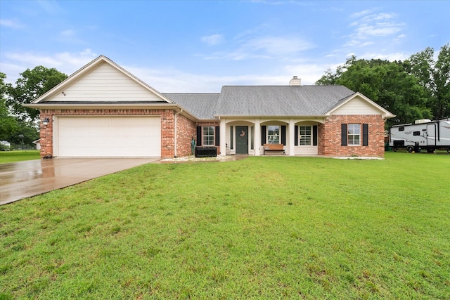 430 Oak Ridge Dr, Fairfield, TX 75840 - ranch-style house featuring driveway, an attached garage, brick siding, a front lawn, and covered porch