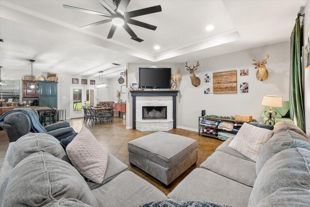 430 Oak Ridge Dr, Fairfield, TX 75840 - living area with a ceiling fan, baseboards, a tray ceiling, recessed lighting, and a fireplace