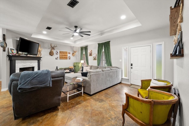 430 Oak Ridge Dr, Fairfield, TX 75840 - living area featuring a tray ceiling, a ceiling fan, a fireplace, and recessed lighting