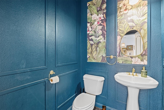 16012 Alvarado Dr, Prosper, TX 75078 - bathroom with toilet and a textured wall