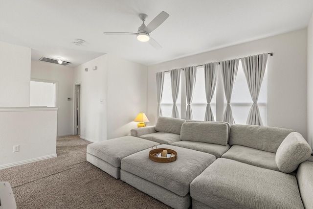 16012 Alvarado Dr, Prosper, TX 75078 - carpeted living area with baseboards and ceiling fan