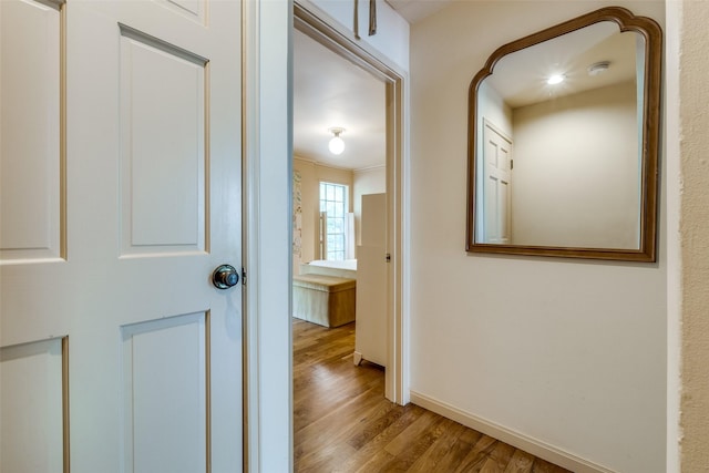 4306 Buena Vista St Unit 106F, Dallas, TX 75205 - corridor with wood finished floors and baseboards