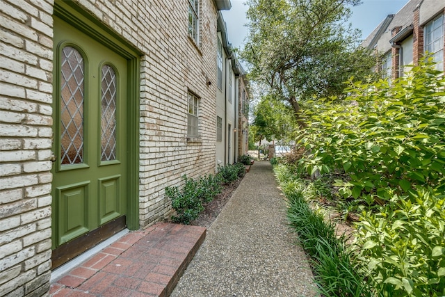 4306 Buena Vista St Unit 106F, Dallas, TX 75205 - view of side of home with brick siding