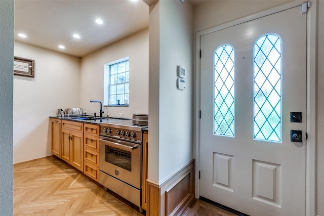 4306 Buena Vista St Unit 106F, Dallas, TX 75205 - entryway with healthy amount of natural light and recessed lighting