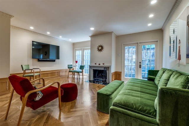 4306 Buena Vista St Unit 106F, Dallas, TX 75205 - living room with wainscoting, recessed lighting, crown molding, and a fireplace with flush hearth