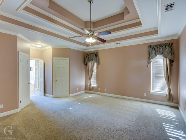 510 Weavers Way, Bossier City, LA 71111 - carpeted spare room featuring a raised ceiling, ceiling fan, crown molding, and baseboards