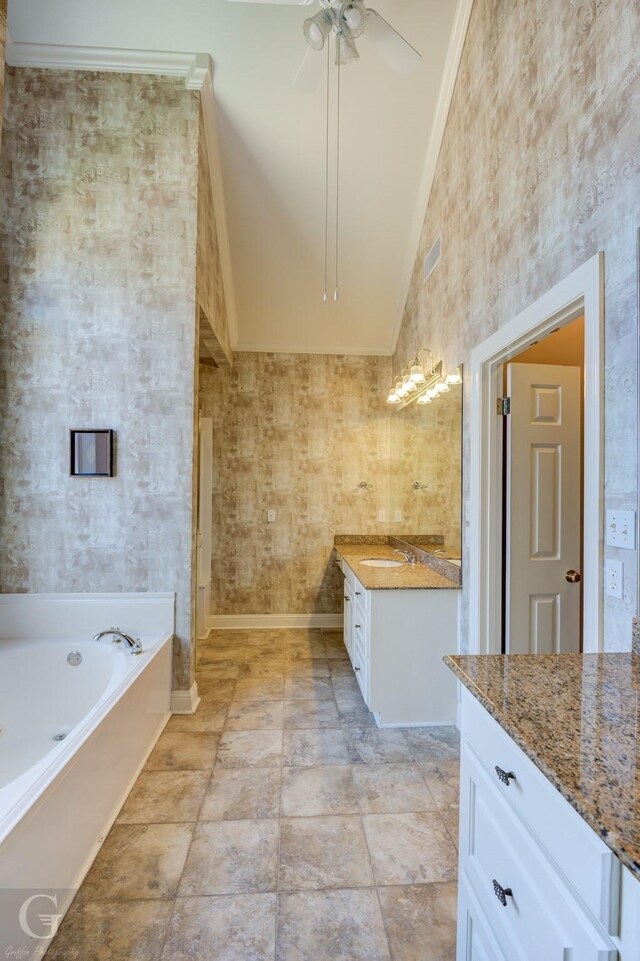 510 Weavers Way, Bossier City, LA 71111 - full bathroom with vanity, a garden tub, vaulted ceiling, ceiling fan, and baseboards