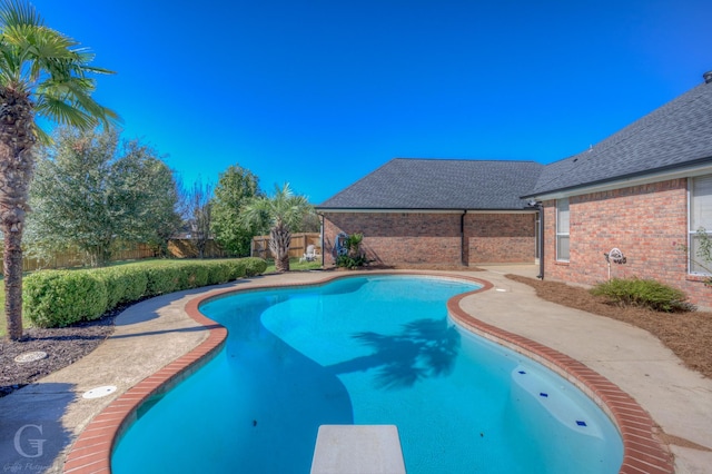510 Weavers Way, Bossier City, LA 71111 - view of swimming pool featuring a diving board and a fenced backyard