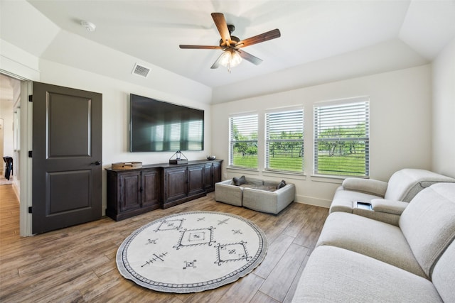 1308 Green Ridge Rd, Weatherford, TX 76085 - living area featuring a ceiling fan, light wood-style floors, and baseboards