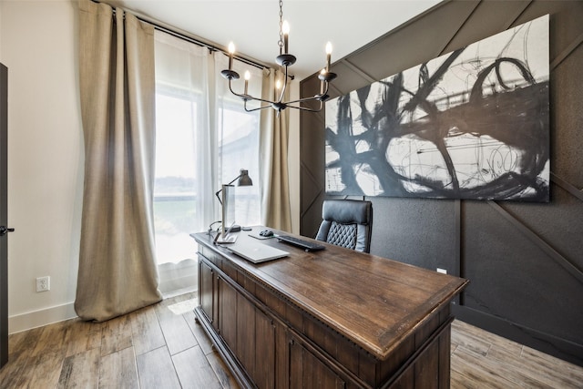1308 Green Ridge Rd, Weatherford, TX 76085 - home office featuring a chandelier, light wood-type flooring, and baseboards