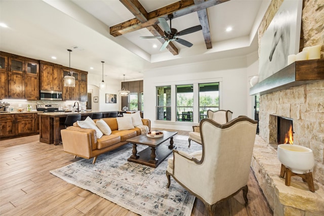 1308 Green Ridge Rd, Weatherford, TX 76085 - living area with recessed lighting, coffered ceiling, a ceiling fan, beamed ceiling, and light wood finished floors