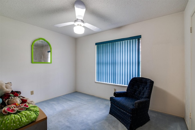 1916 Cobblestone Ln, Garland, TX 75042 - sitting room with carpet floors and a ceiling fan