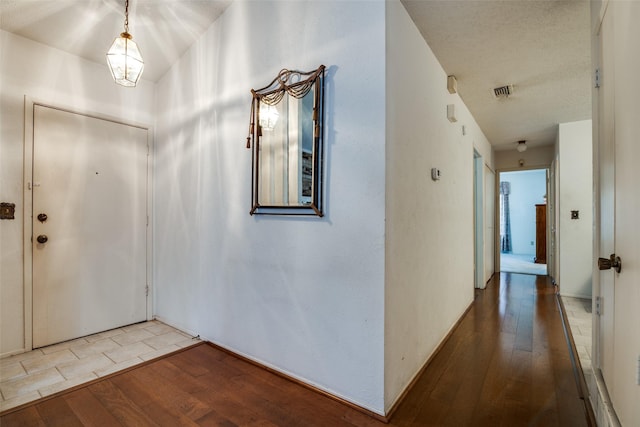 1916 Cobblestone Ln, Garland, TX 75042 - foyer featuring hardwood / wood-style flooring