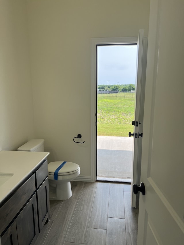 411 Solo Ridge Dr, Waxahachie, TX 75167 - bathroom with wood finished floors and vanity