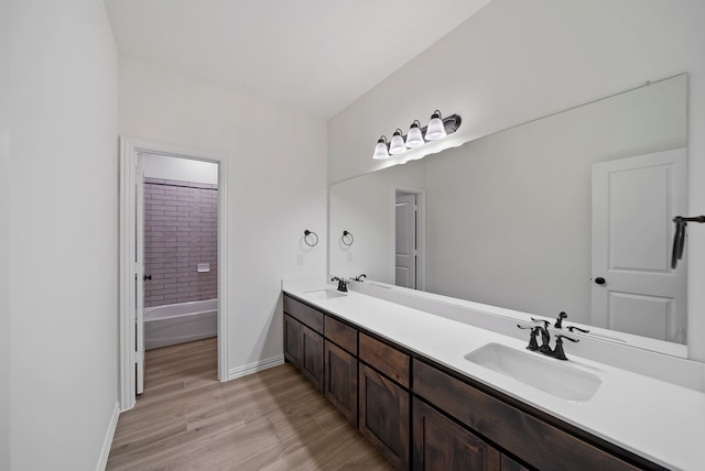 411 Solo Ridge Dr, Waxahachie, TX 75167 - full bath featuring double vanity and wood finished floors