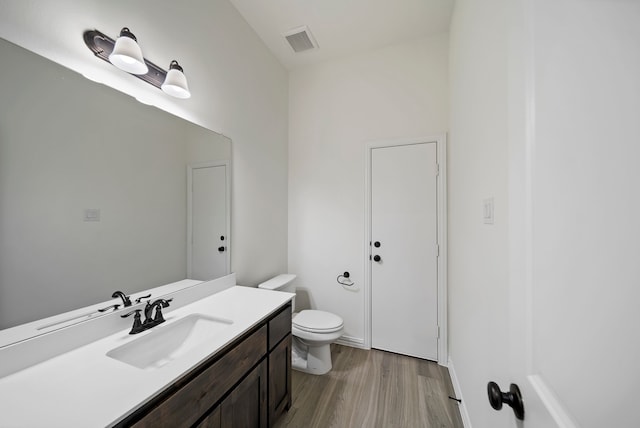 411 Solo Ridge Dr, Waxahachie, TX 75167 - bathroom featuring wood finished floors and vanity