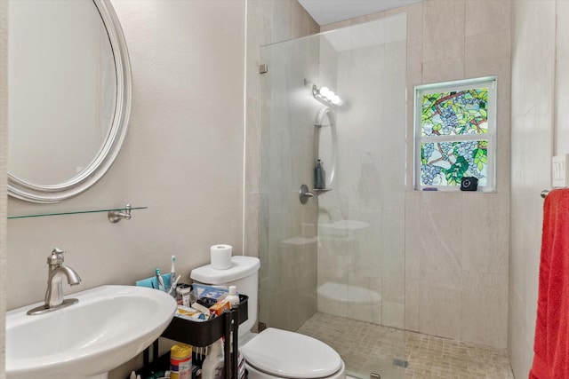10040 Fm 17, Grand Saline, TX 75140 - full bath featuring a sink, a shower stall, and toilet