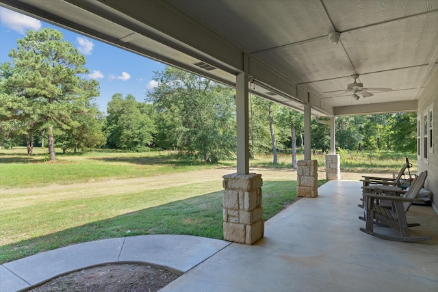 10040 Fm 17, Grand Saline, TX 75140 - view of patio featuring ceiling fan and view of wooded area