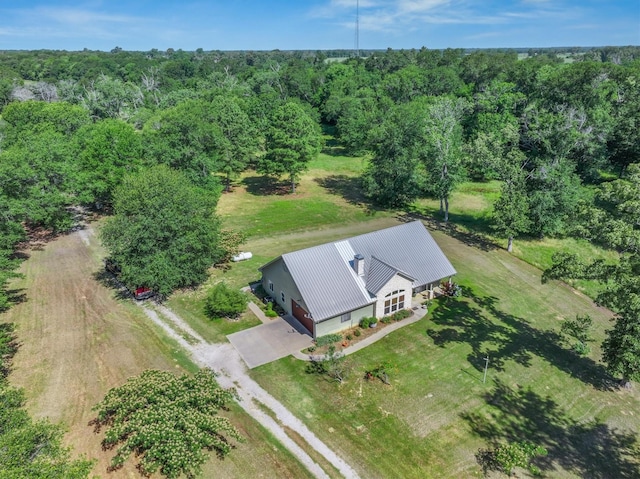 10040 Fm 17, Grand Saline, TX 75140 - aerial view of property and surrounding area featuring a heavily wooded area