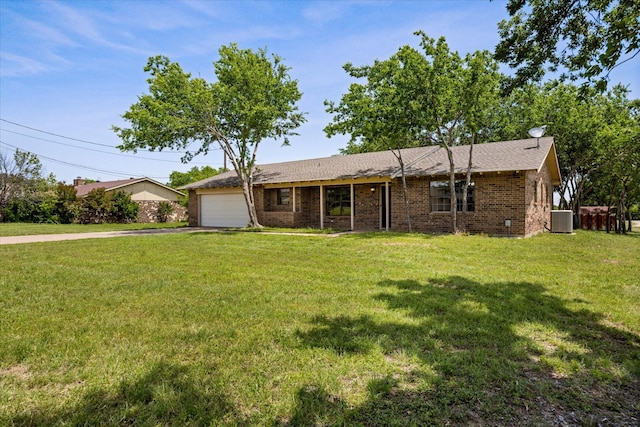 1023 Holmes Dr, Granbury, TX 76048 - ranch-style home featuring central AC, an attached garage, asphalt driveway, and a front yard