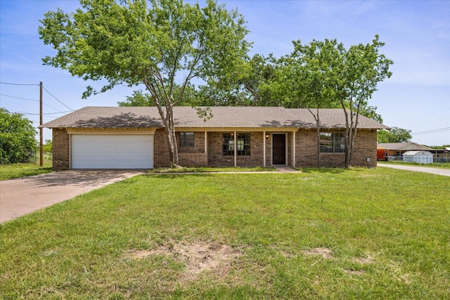 1023 Holmes Dr, Granbury, TX 76048 - view of front facade featuring an attached garage, driveway, a front lawn, and brick siding