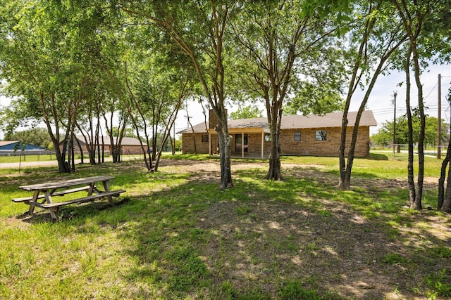 1023 Holmes Dr, Granbury, TX 76048 - view of grassy yard