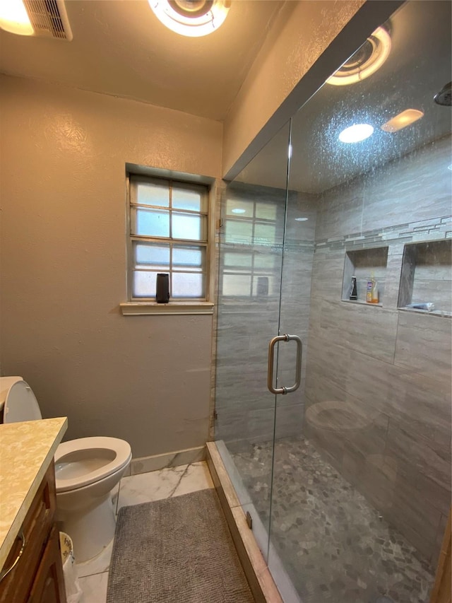 1203 Springbrook Cir, Desoto, TX 75115 - full bathroom with toilet, marble look tiles, vanity, a shower stall, and baseboards