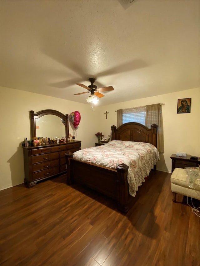 1203 Springbrook Cir, Desoto, TX 75115 - bedroom with dark wood-type flooring and a ceiling fan