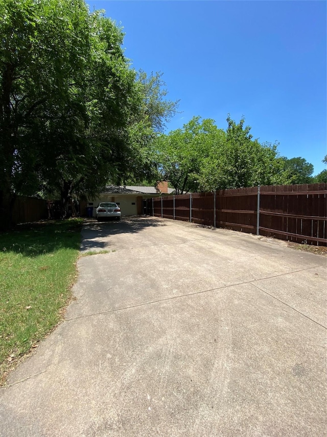 1203 Springbrook Cir, Desoto, TX 75115 - view of yard featuring driveway