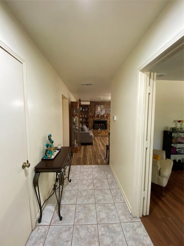 1203 Springbrook Cir, Desoto, TX 75115 - hallway featuring light tile patterned floors