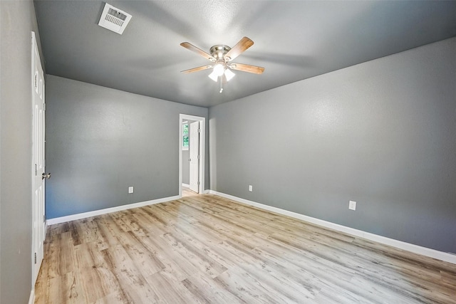 906 S Willow St, Sherman, TX 75090 - empty room with a ceiling fan and light wood finished floors