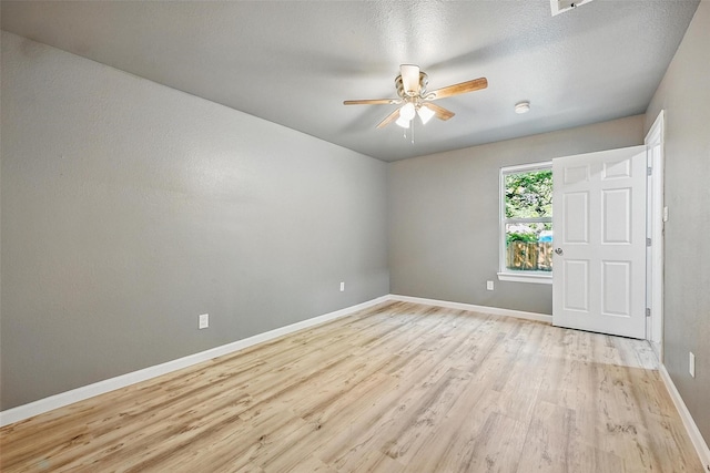 906 S Willow St, Sherman, TX 75090 - empty room with light wood-type flooring and ceiling fan