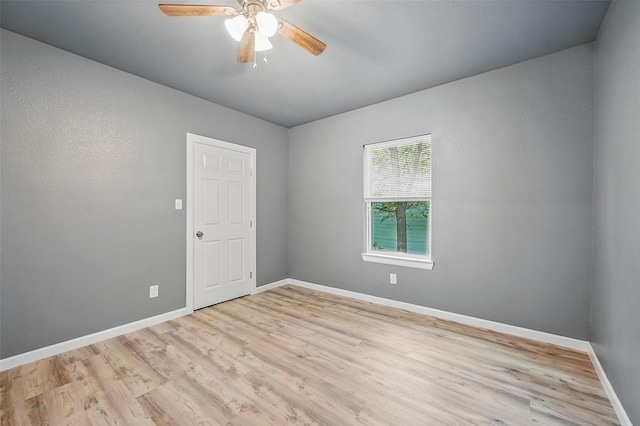 906 S Willow St, Sherman, TX 75090 - empty room with wood finished floors and ceiling fan