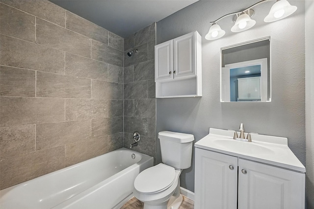 906 S Willow St, Sherman, TX 75090 - bathroom with vanity, tub / shower combination, and wood finished floors