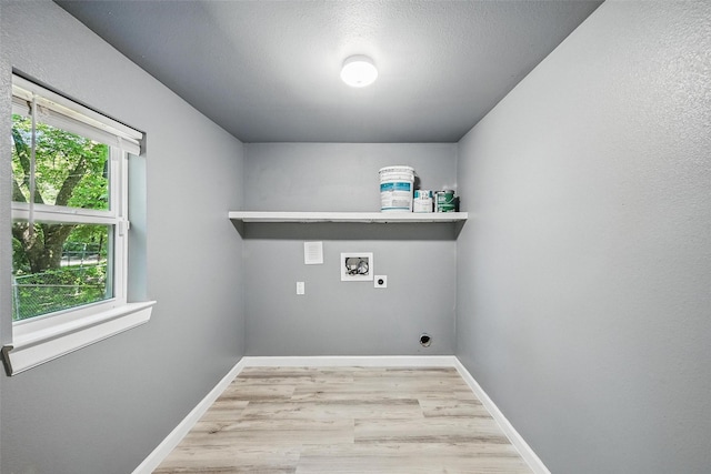 906 S Willow St, Sherman, TX 75090 - washroom featuring electric dryer hookup, hookup for a washing machine, and wood finished floors