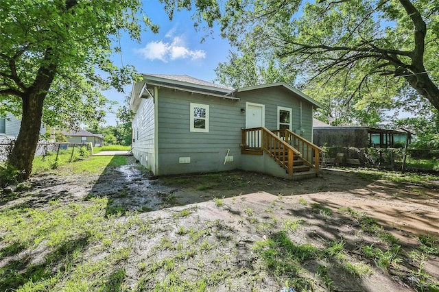 906 S Willow St, Sherman, TX 75090 - rear view of property featuring crawl space