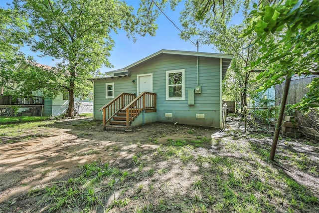 906 S Willow St, Sherman, TX 75090 - back of property with crawl space