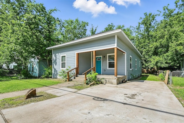 906 S Willow St, Sherman, TX 75090 - view of front of house featuring covered porch and concrete driveway