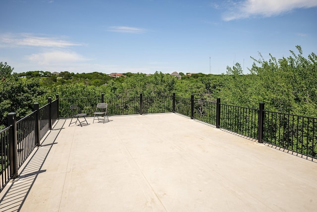 2415 Amberleaf Ct, Cedar Hill, TX 75104 - view of patio featuring a forest view