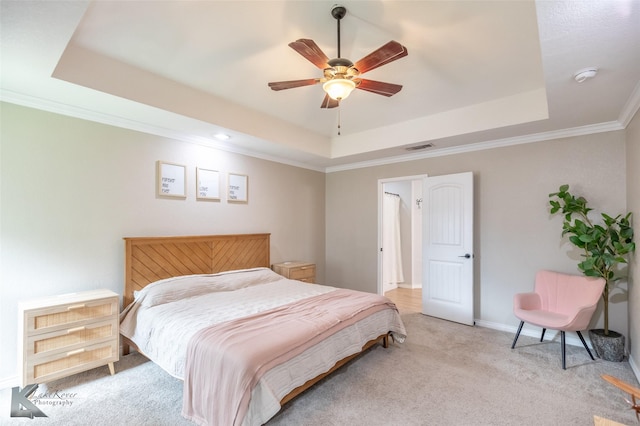 3009 Sterling St, Abilene, TX 79606 - bedroom with a tray ceiling, carpet floors, baseboards, crown molding, and ceiling fan